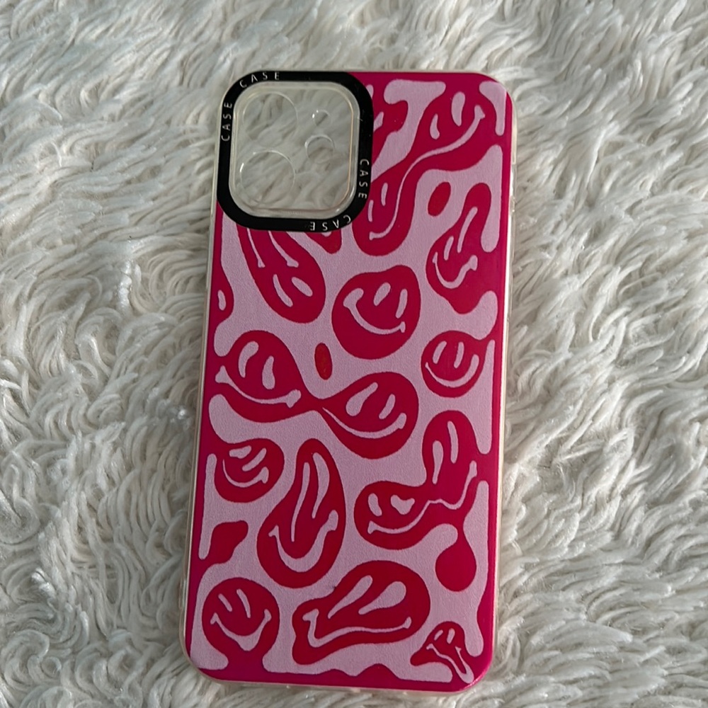 Pink smiley face iPhone 12 Case